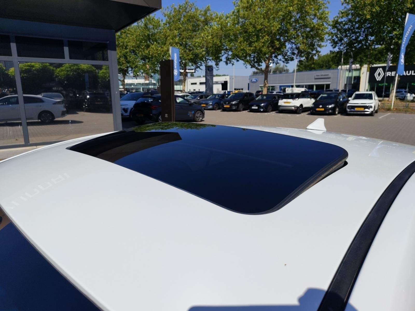 Hyundai IONIQ 1.6 GDi PHEV Premium | schuif/kanteldak | Zeer, Auto's, 12 maanden, Gebruikt, Wit, Plug-in hybride
