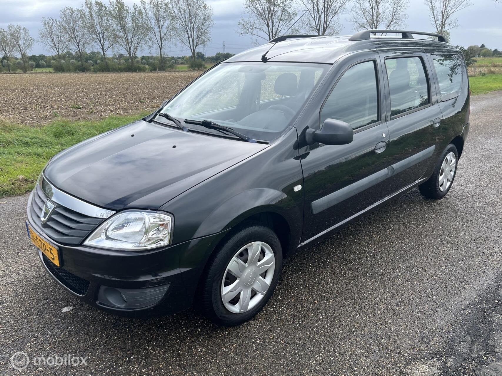 Dacia Logan MCV 1.6 MPI Aniversare /Airco/5p/Trekhaak, Auto's, Euro 5, Stof, Gebruikt, 4 cilinders