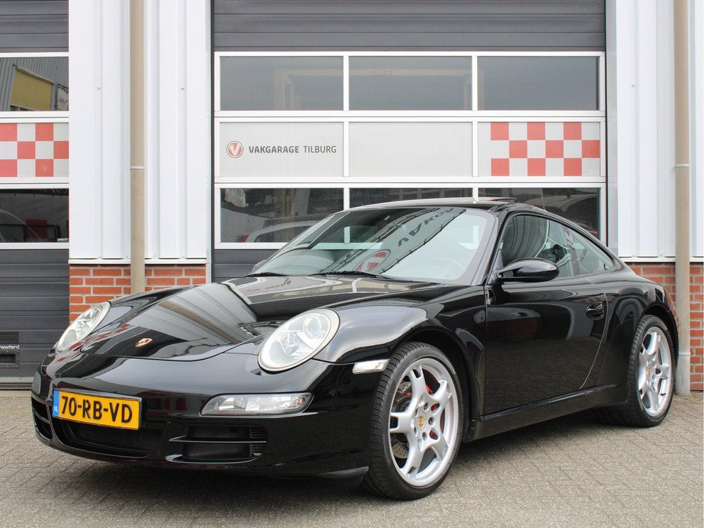 Porsche 911 3.6 Carrera 325PK NL AUTO/Climate/Cruise control, Auto's, Automaat, Achterwielaandrijving, Zwart, 4 stoelen