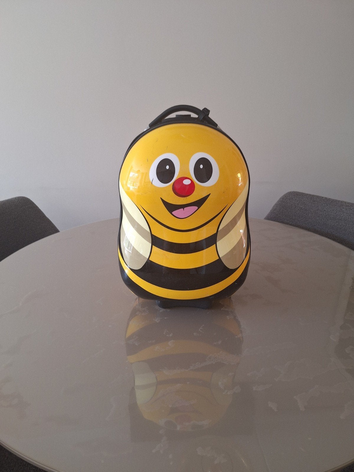 Handige (kinder) koffer, Ophalen