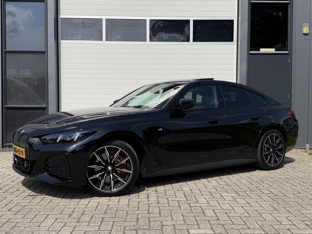 BMW I4 (g26) eDrive35 286pk, Auto's, BMW, Gebruikt, Zwart, Zwart, 1975 kg