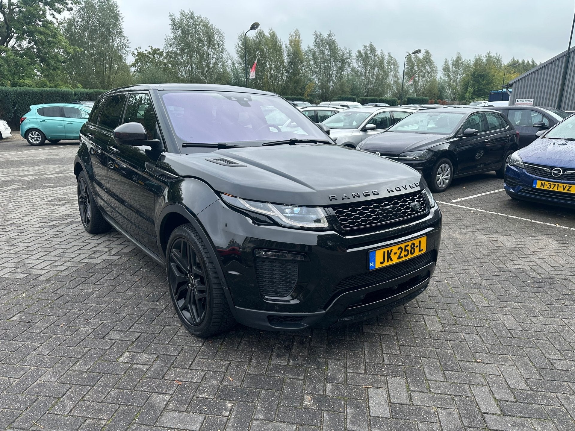 Land Rover Range Rover Evoque 2.0 Si4 Autobiography , leer a, Auto's, Dealer onderhouden, Euro 6, 4 cilinders, Zwart