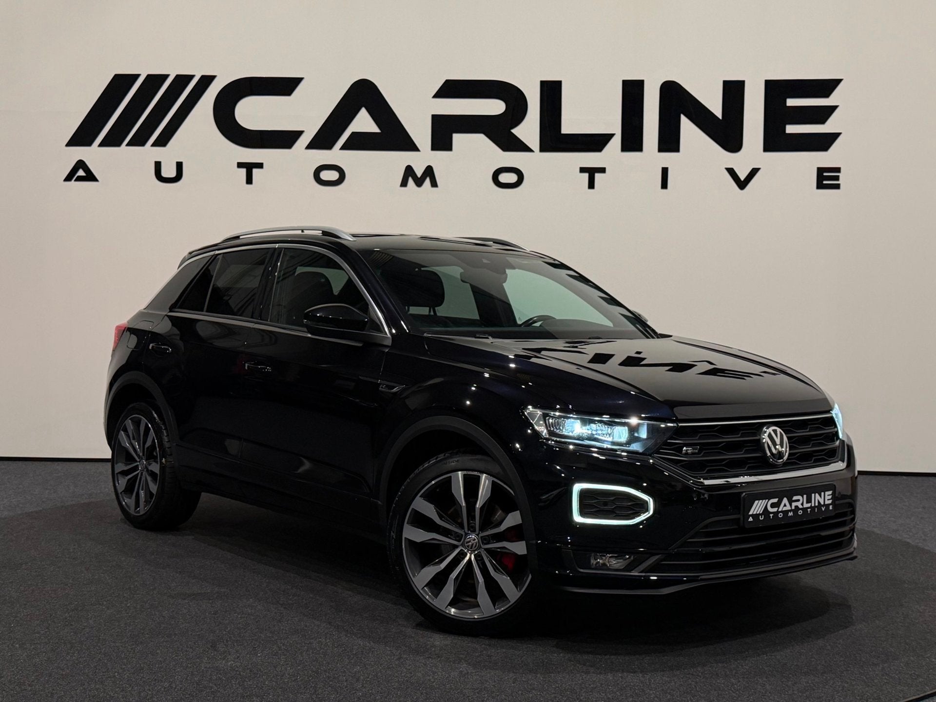 Volkswagen T-Roc 1.5 TSI Sport 2X R-LINE AUT. SFEERVERL. VIR, Auto's, Dealer onderhouden, 4 cilinders, 150 pk, Leder en Stof