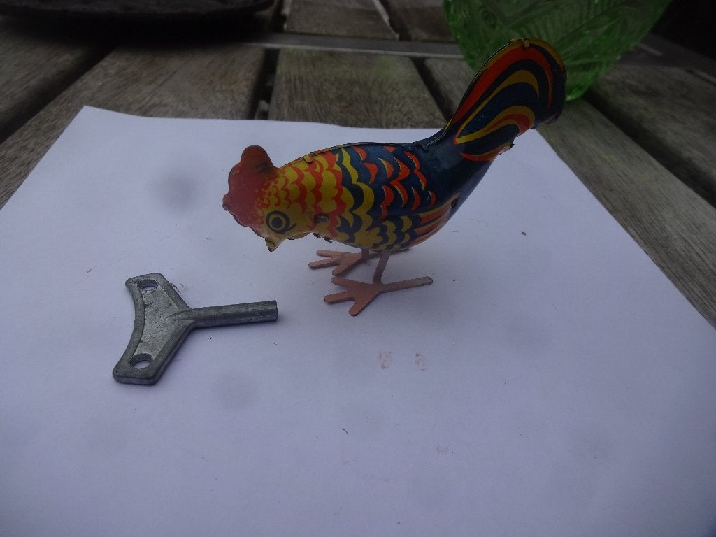 Blikken speelgoed haan als hij opgedraaid is gaat hij pikken, Ophalen of Verzenden