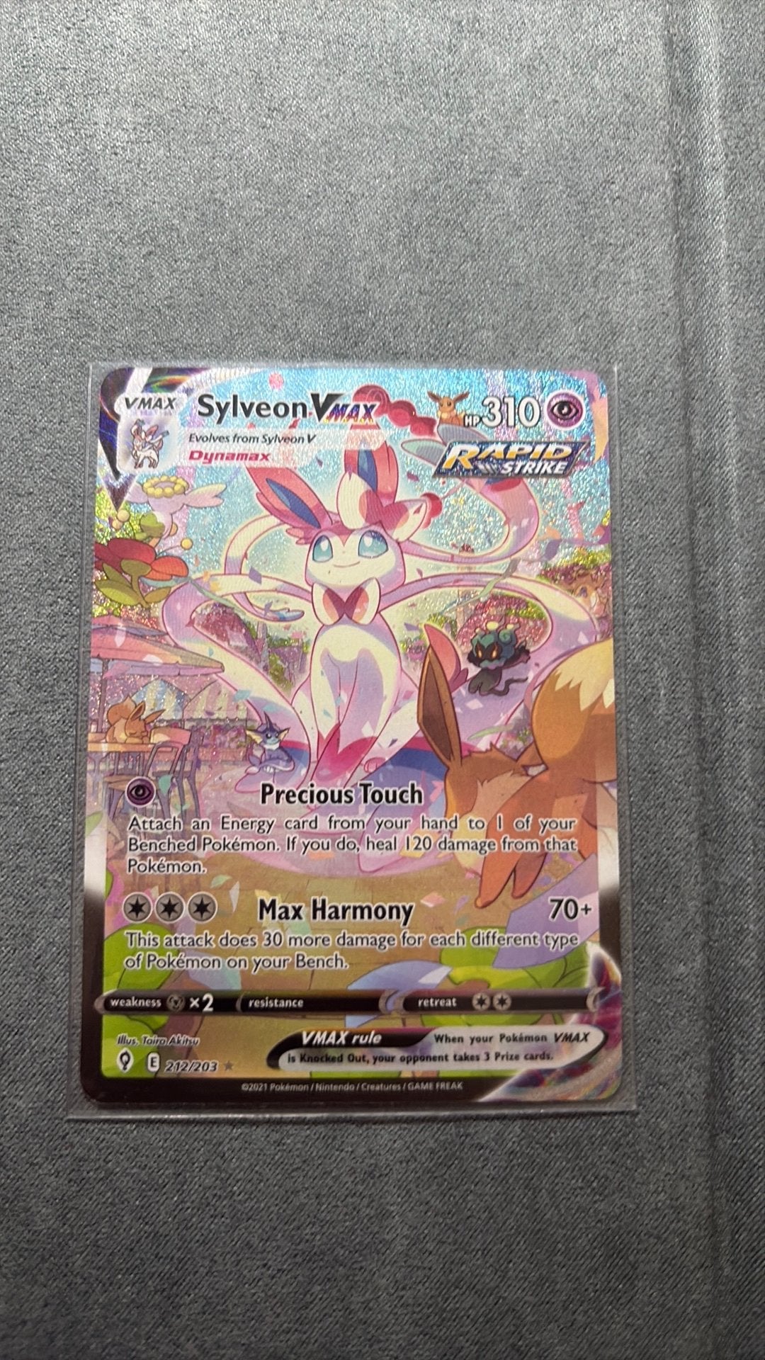 sylveon vmax evs212, Hobby en Vrije tijd, Ophalen of Verzenden, Zo goed als nieuw