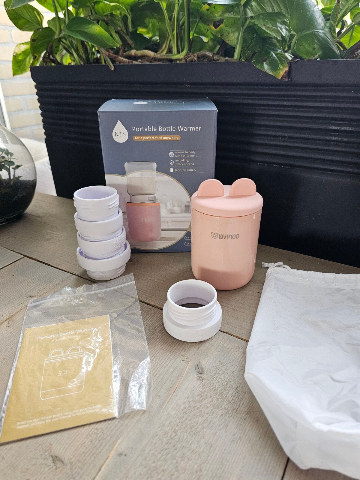 Draagbare flessenwarmer Lovinoo, Kinderen en Baby's, Babyvoeding en Toebehoren, Ophalen of Verzenden, Zo goed als nieuw, Flessen- of potjesverwarmer