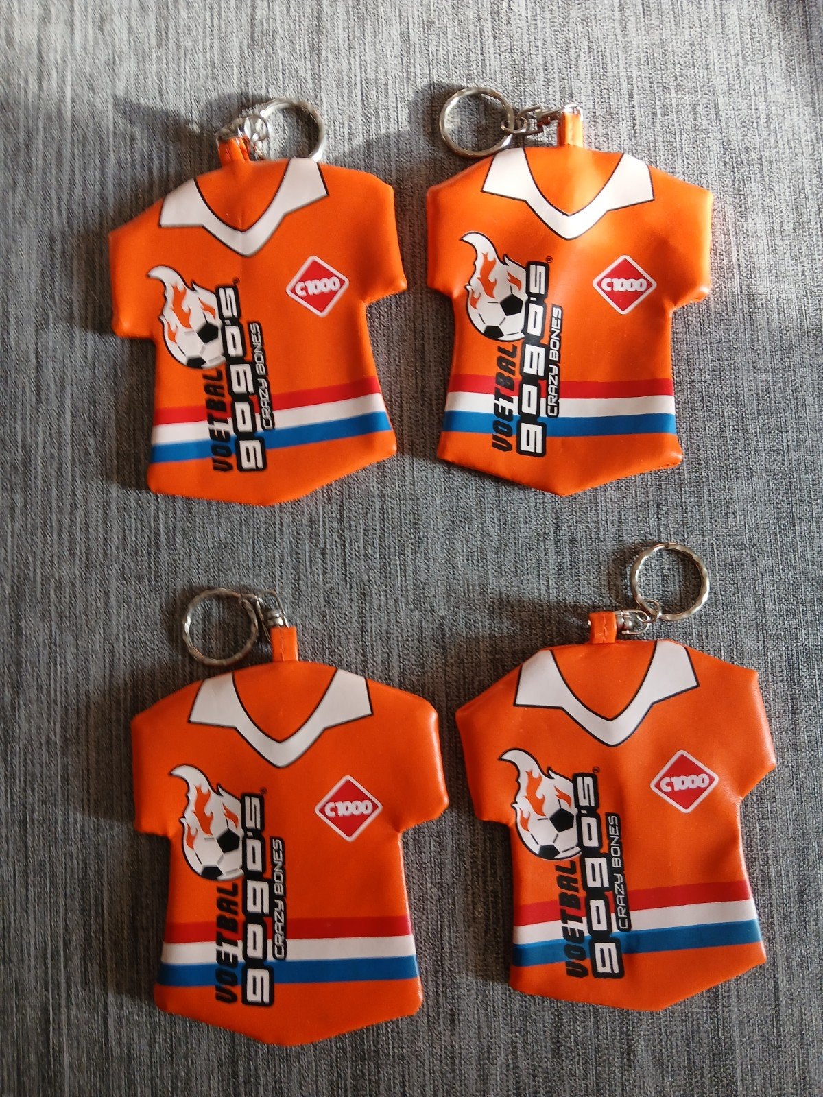 Set van 4 nieuwe C1000 Voetbal Crazy Bones sleutelhangers, Verzamelen, Ophalen of Verzenden, Nieuw, Sport