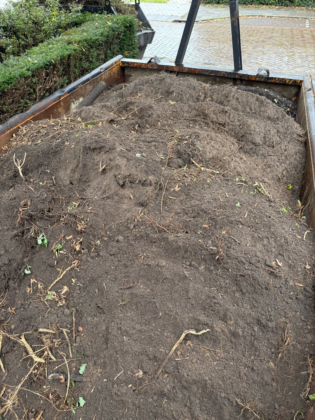 Zwarte tuinaarde, Ophalen, Tuinaarde