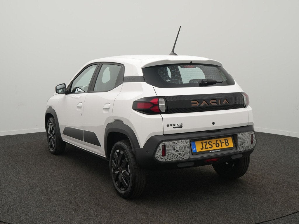 Dacia Spring Extreme 65 26.8 kWh - Demo - DC Lader - Noodlaa, Auto's, Dacia, Stof, Gebruikt, Zwart, 38 min