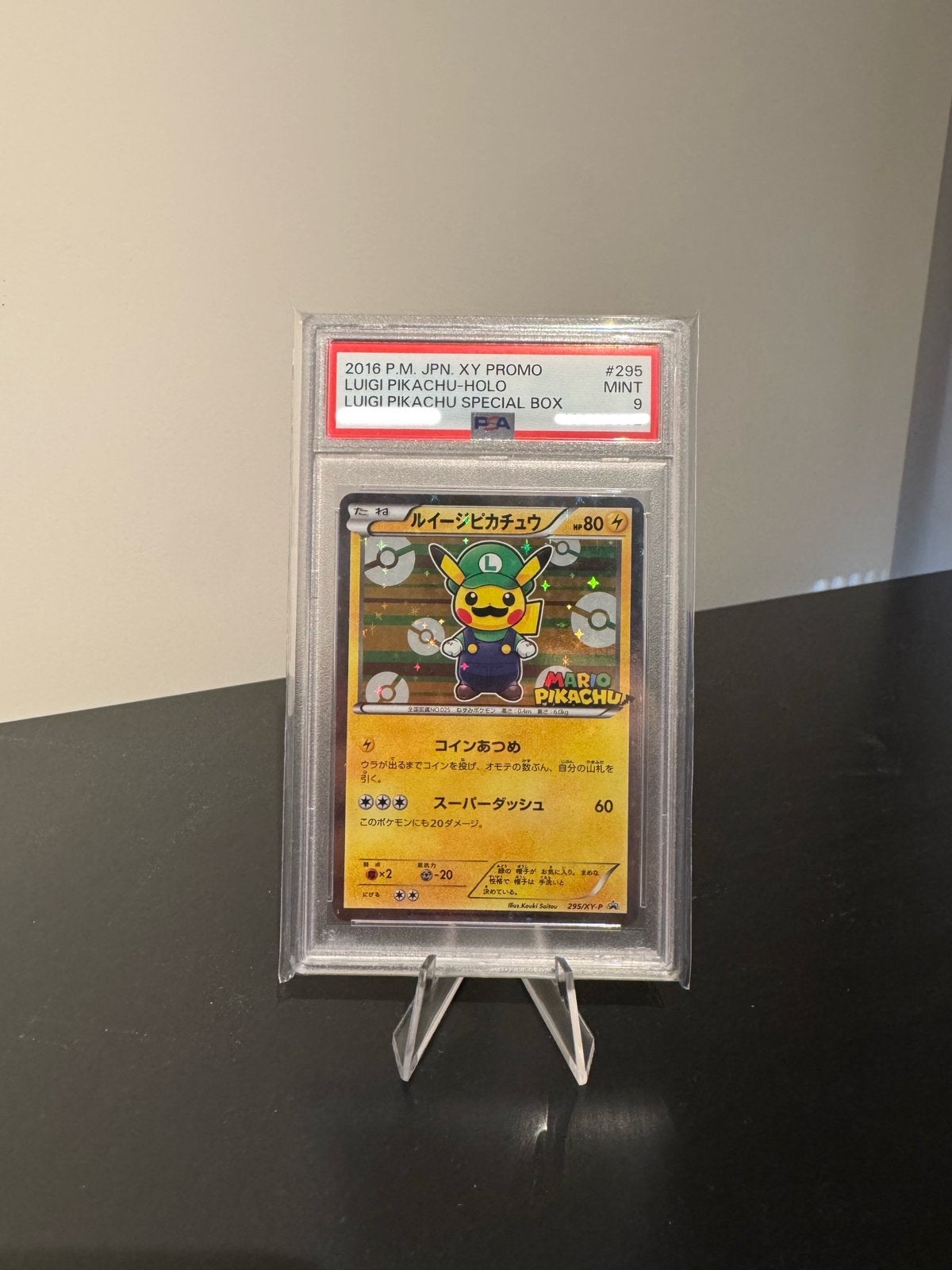 LUIGI PIKACHU PONCHO HALF ART - PSA9, Ophalen of Verzenden, Zo goed als nieuw