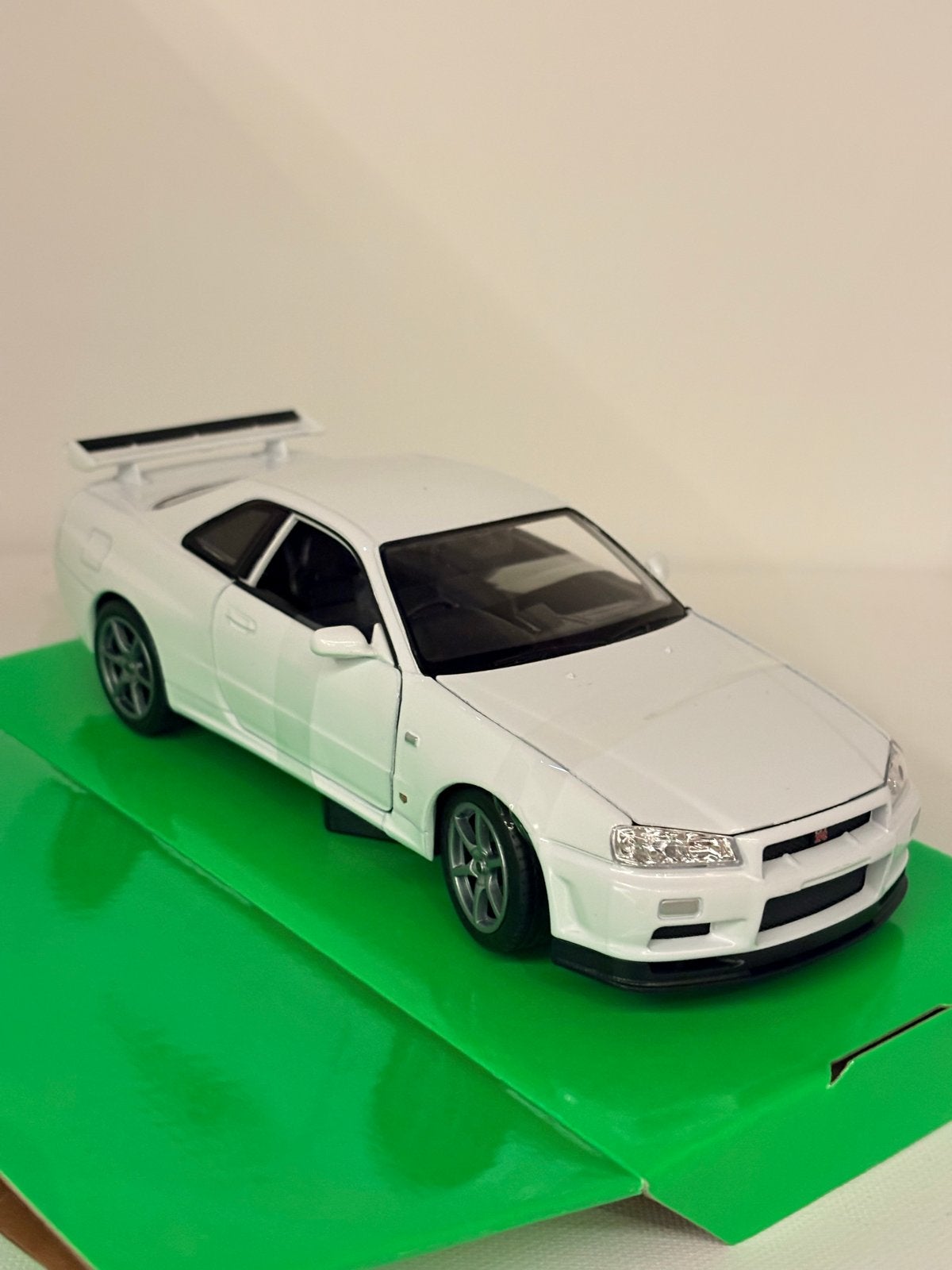 Welly NEX 1:24 Nissan Skyline GT-R (R34) modelauto, Auto, Nieuw, Ophalen of Verzenden, Welly