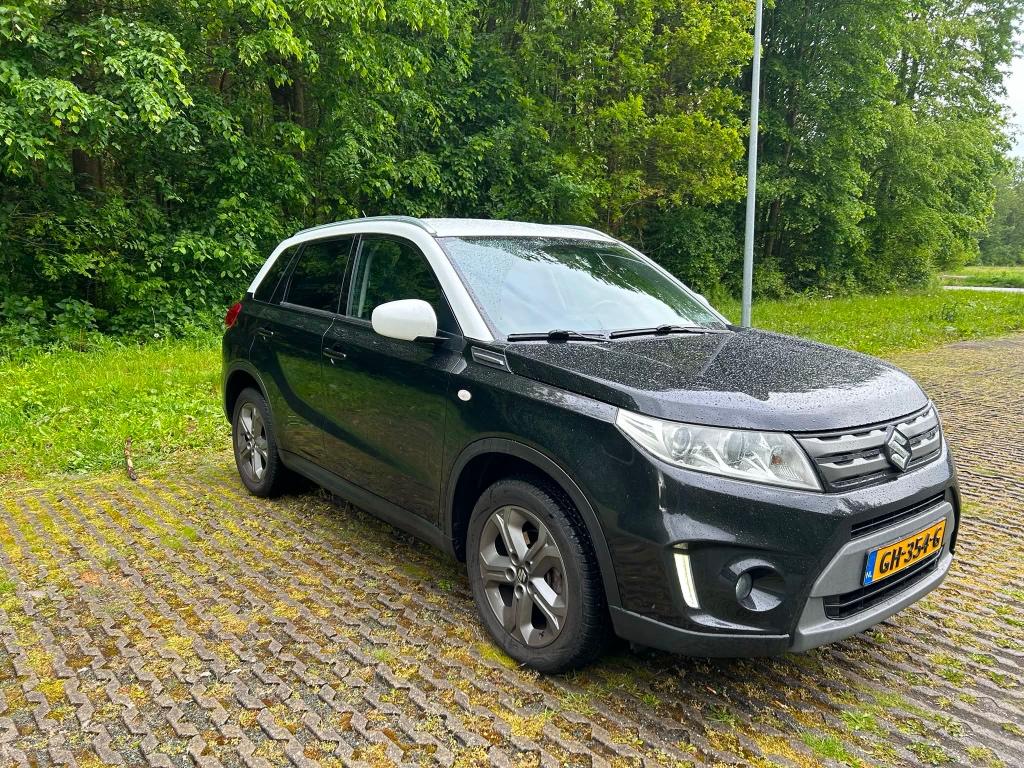 Suzuki Vitara 1.6 VVT 120pk 2WD 2015 Zwart, Auto's, Voorwielaandrijving, Stof, 40 €/maand, 4 cilinders