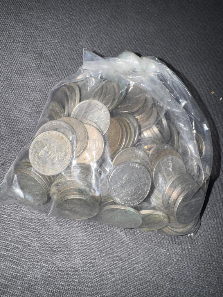 Zak vol Amerikaanse dollars (munten), Ophalen, Noord-Amerika, Setje