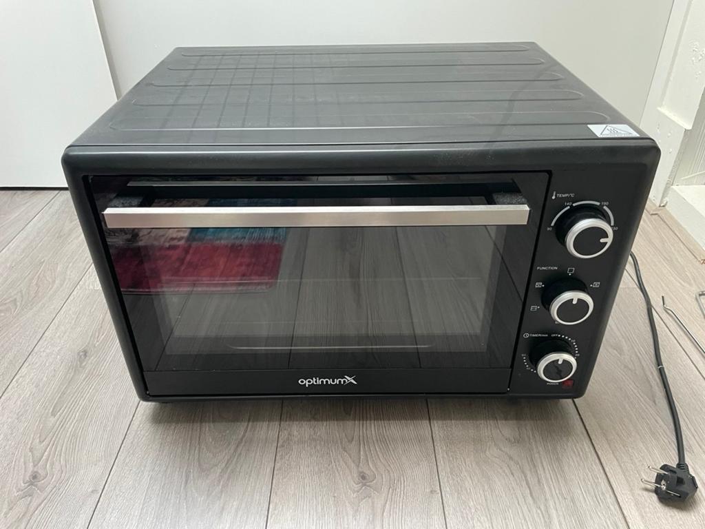 tafeloven van het merk OptimumX, model KR-K55RCL-10dkh., Witgoed en Apparatuur, Ovens, Gebruikt, Oven met grill, Minder dan 45 cm