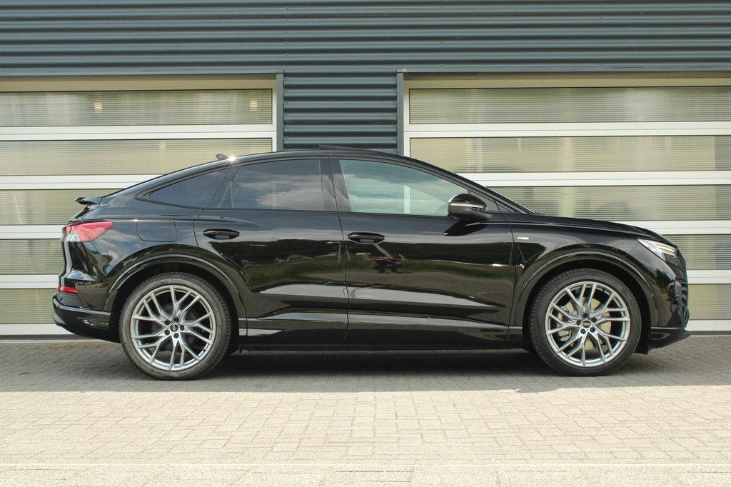 Audi Q4 Sportback e-tron 45 286pk quattro S Edition Competit, Auto's, Audi, Automaat, 12 maanden, Zwart, 82 kWh