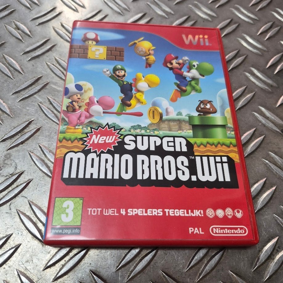 New Super Mario Bros. Wii met boekje en garantie, 1 speler, Ophalen of Verzenden, Zo goed als nieuw, X