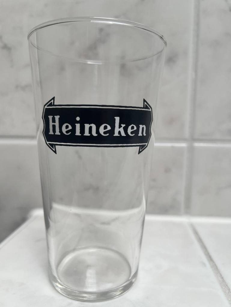 HEINEKEN GLAS met bijzonder logo., Ophalen of Verzenden, Zo goed als nieuw, Glas of Glazen, Heineken