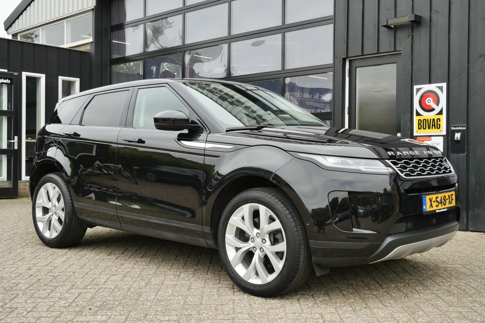 Land Rover Range Rover Evoque 2.0 P200 AWD 200PK | Memory |, Auto's, 1800 kg, 4 cilinders, Zwart, Bedrijf