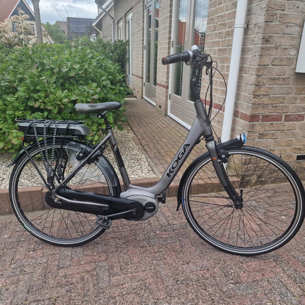 Zeer nette Koga E-Nova met Bosch middenmotor, Ophalen, Zo goed als nieuw, 51 tot 55 cm, 50 km per accu of meer
