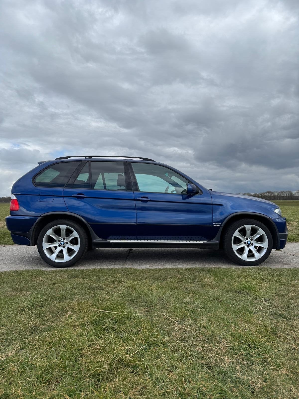 BMW X5 4.8 I AUT 2004 Blauw, Auto's, Automaat, 2175 kg, Blauw, Origineel Nederlands