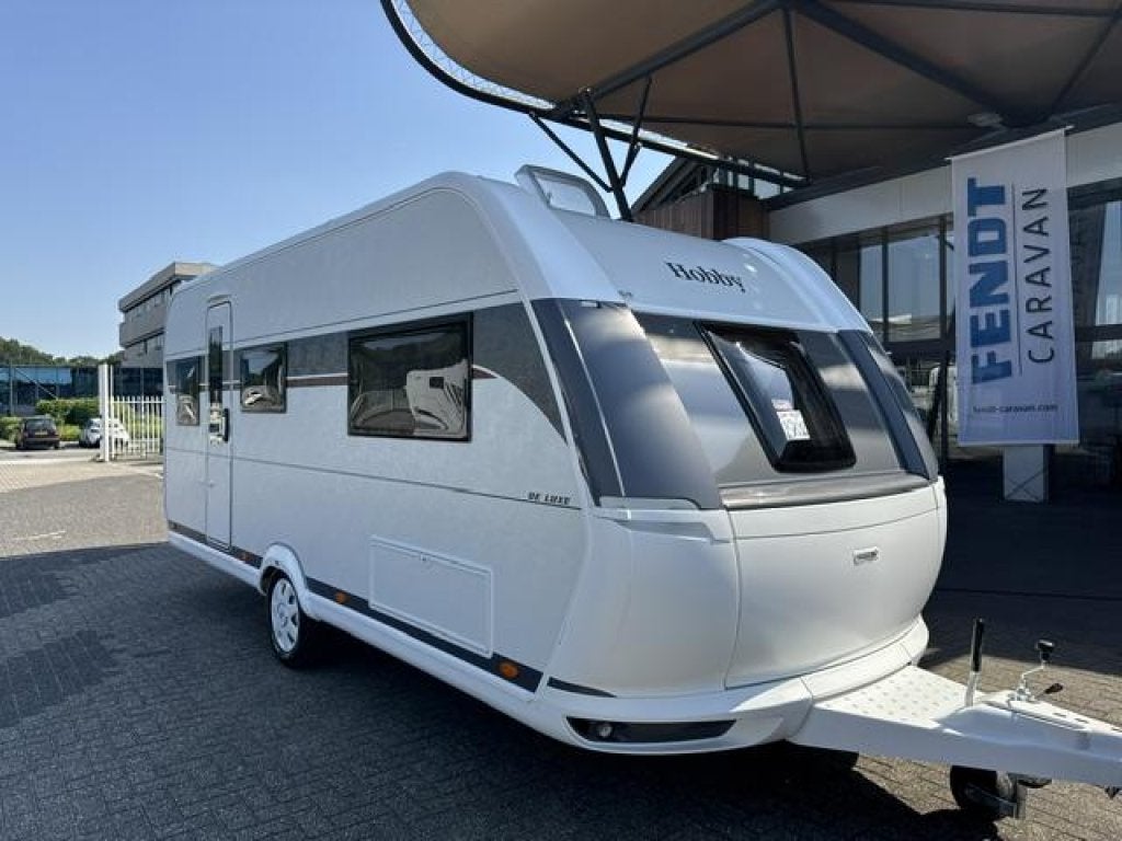 Hobby De Luxe 495 UL 2027 NIEUW BINNEN!!!, Schokbreker, Standaardzit, Hobby, 2 aparte bedden