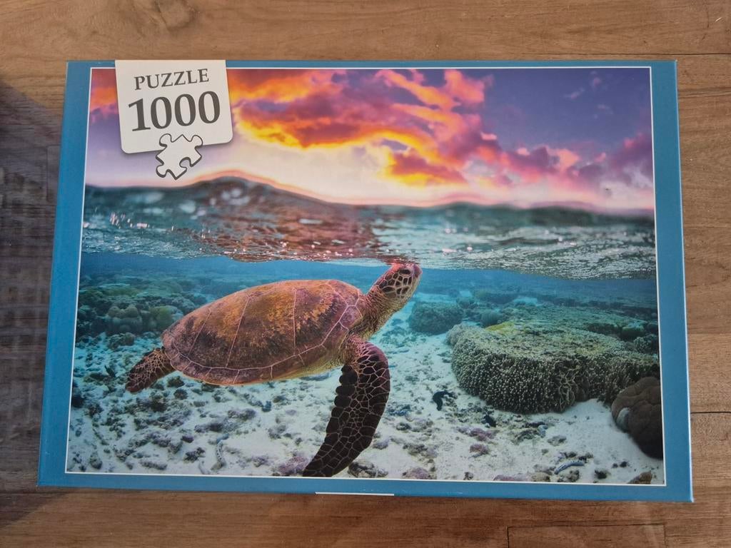 Puzzel 1000 stukjes: Schildpad onder water bij zonsondergang, Ophalen of Verzenden, 500 t/m 1500 stukjes, Zo goed als nieuw, Legpuzzel