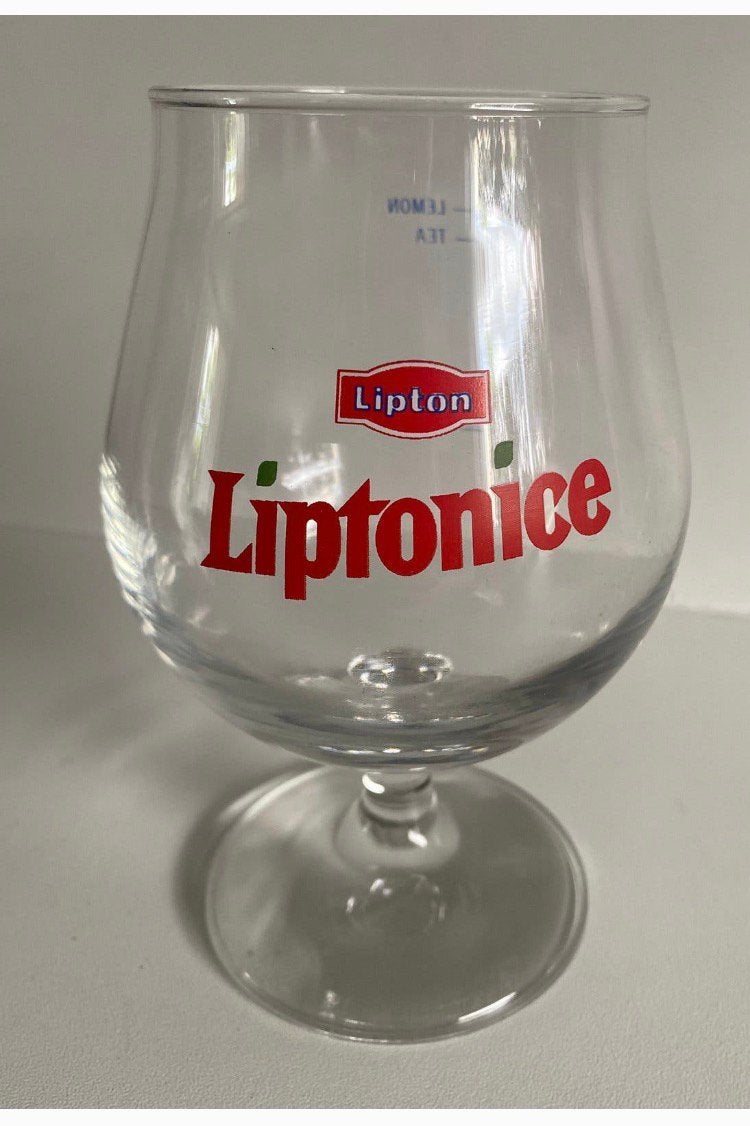 Groot Lipton Liptonice glas op voet. Hoogte 14,5 cm., Ophalen of Verzenden, Zo goed als nieuw, Frisdrankglas