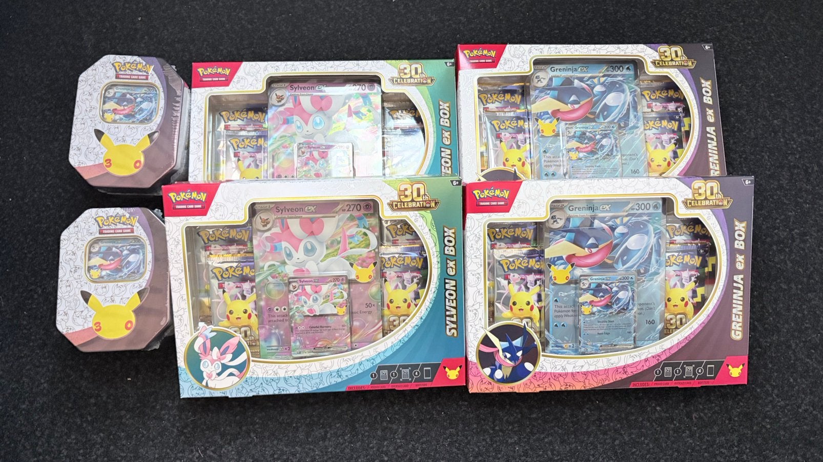 Pokemon 30th celebration sylveon en greninja ex box en tin