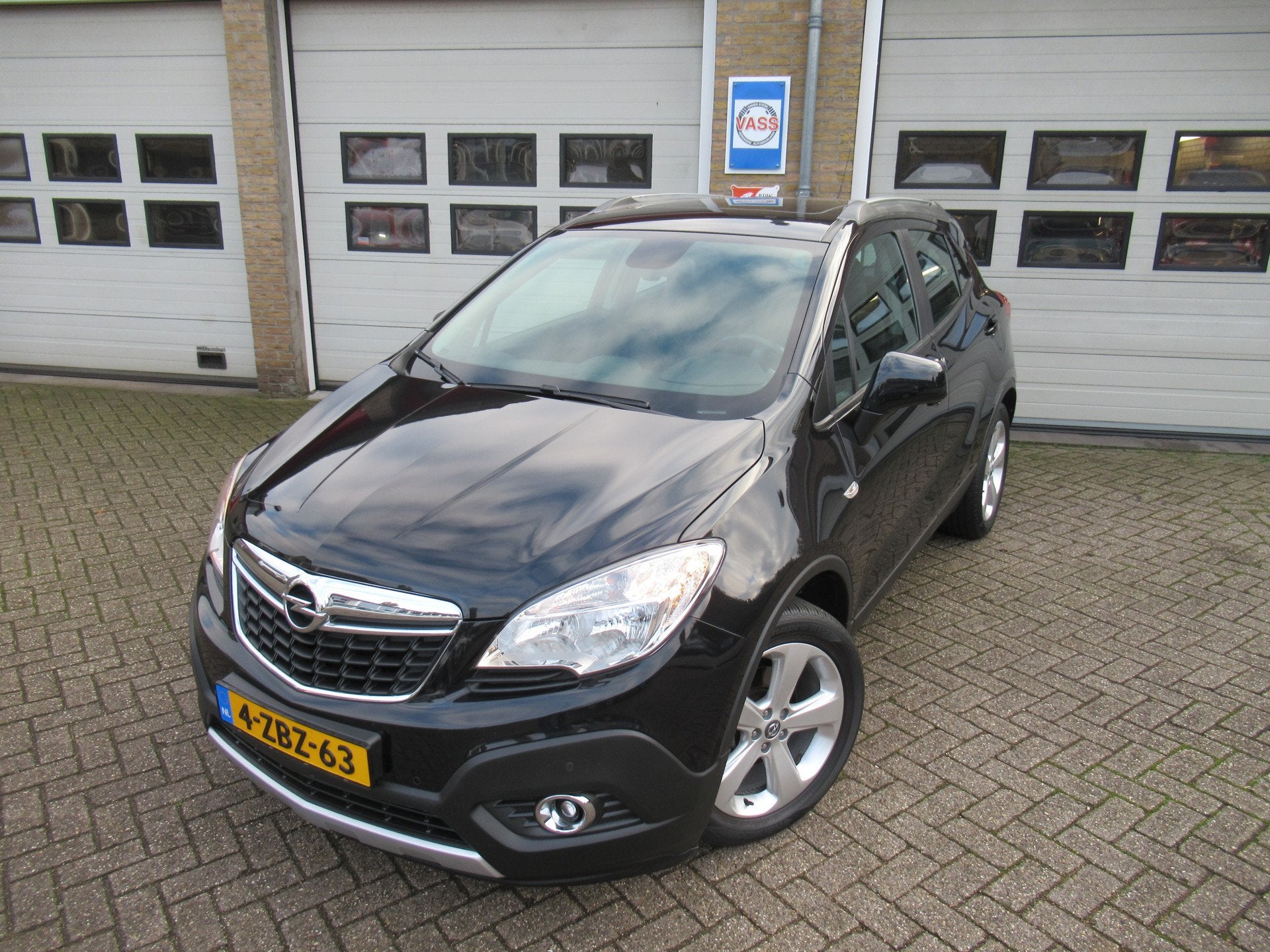 Opel Mokka 1.6 Edition (bj 2012), Auto's, Voorwielaandrijving, Euro 5, Gebruikt, 4 cilinders