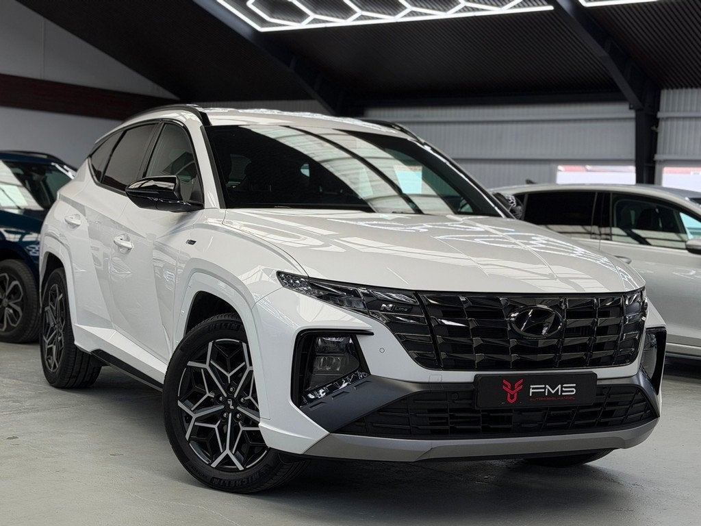 Hyundai Tucson 1.6 T-GDI HEV N Line Camera CarPlay 230pk, Auto's, Hyundai, Gebruikt, Zwart, 4 cilinders, Met garantie (alle)