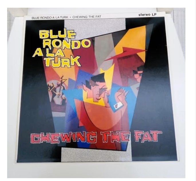 original lp- blue rondo a la turk-chewing the fat *1982*, LP, Overige genres, Ophalen of Verzenden, Zo goed als nieuw