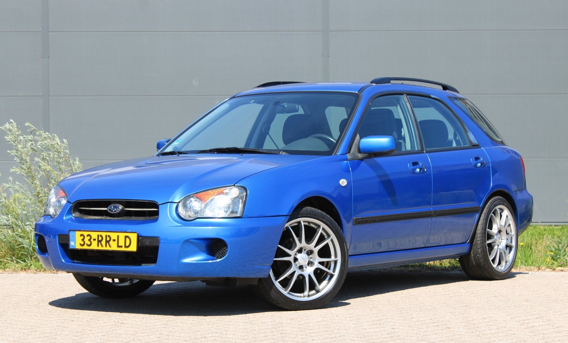 Subaru Impreza Plus 1.6 TS AWD CruiseControl Airco 18INCH !N, Auto's, Stof, Gebruikt, Zwart, Blauw