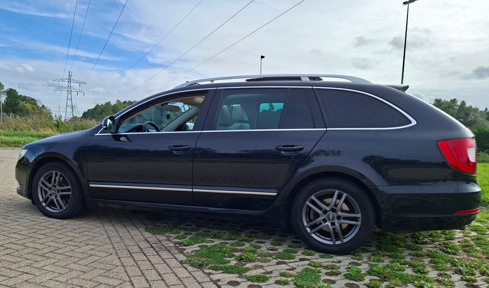 Skoda Superb 2.0 TSI 147KW Combi DSG 2012 Zwart, 4 cilinders, 1984 cc, Zwart, Stationwagon