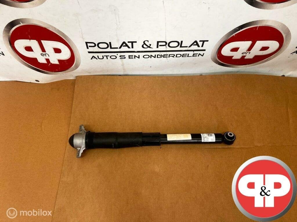 VW Golf 7 Schokdemper Veerpoot Achterzijde 5Q0512011JQ