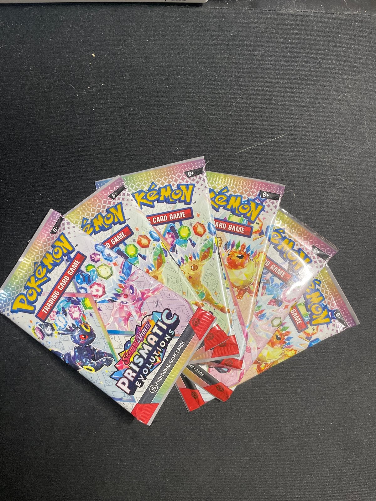 6 pakjes Prismatic Evolutions Pokémon kaarten, Hobby en Vrije tijd, Verzamelkaartspellen | Pokémon, Nieuw, Booster, Ophalen of Verzenden