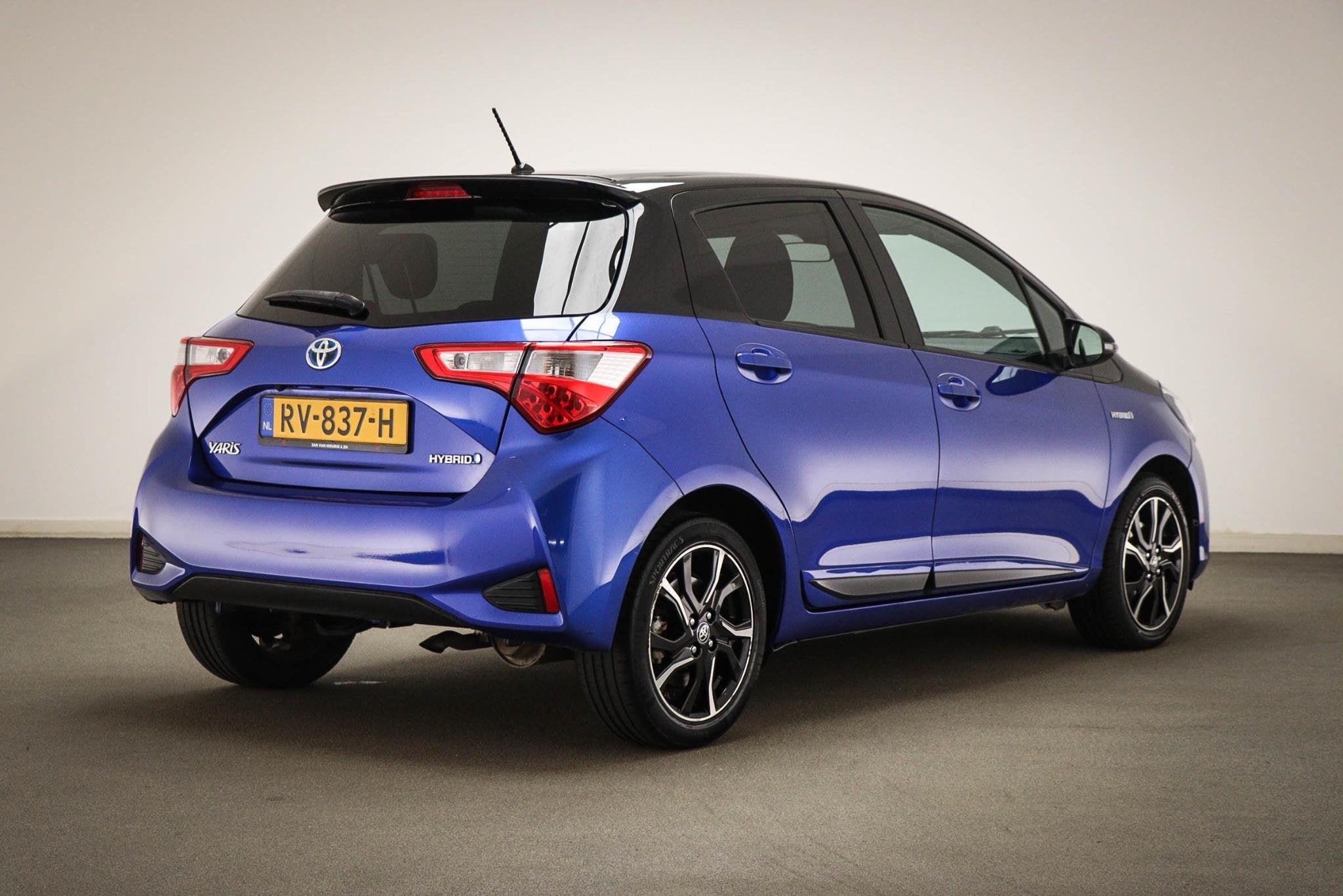 Toyota Yaris 1.5 Hybrid Bi-Tone | NAVIGATIE | CLIMA | CAMERA, Gebruikt, 4 cilinders, Met garantie (alle), Blauw
