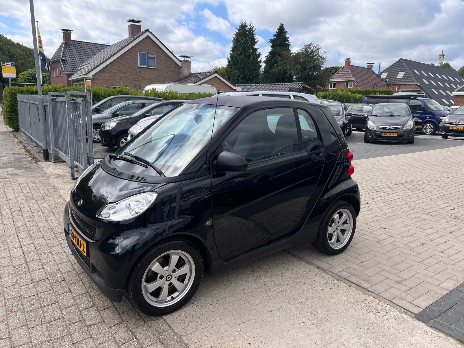 Smart ForTwo 1.0AUT 2012 Zwart 46991 km, Auto's, Smart, Automaat, Achterwielaandrijving, 18 €/maand, 61 pk