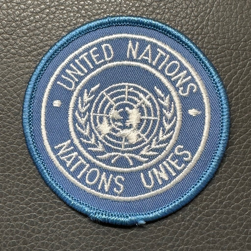 Stoffen embleem United Nations / Nations Unies Ø 7cm, Ophalen, Overige soorten, Overige gebieden, Embleem of Badge