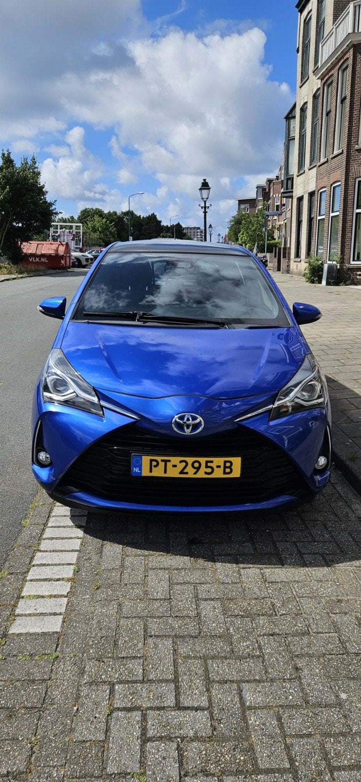 Toyota Yaris 1.5 Hybrid 100pk 5D CVT 2017 Blauw, Blauw, 49 €/maand, Origineel Nederlands, Grijs