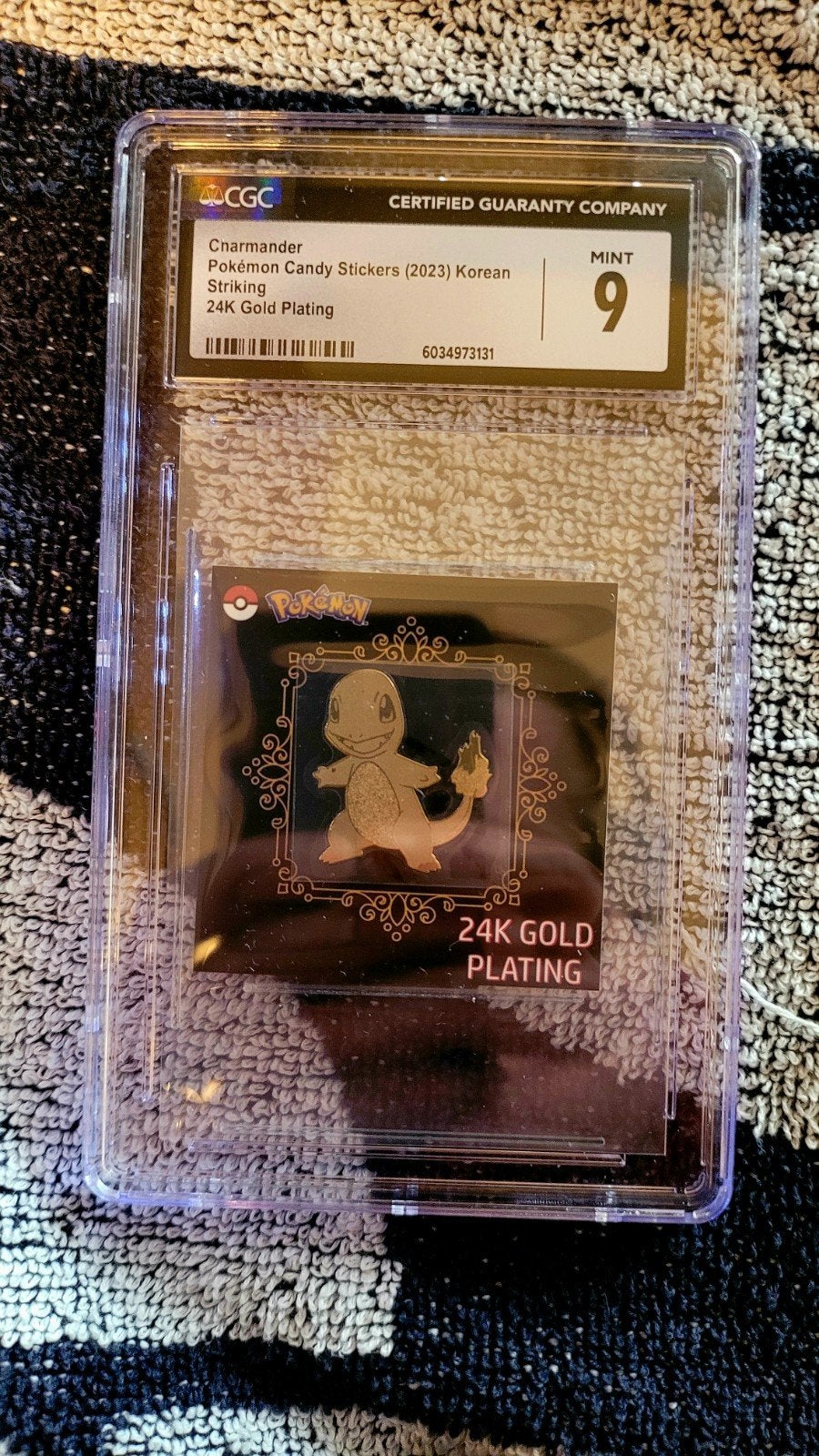 Charmander 24K Gold Plated Pokémon Kaart CGC Mint 9, Ophalen of Verzenden, Zo goed als nieuw, Losse kaart