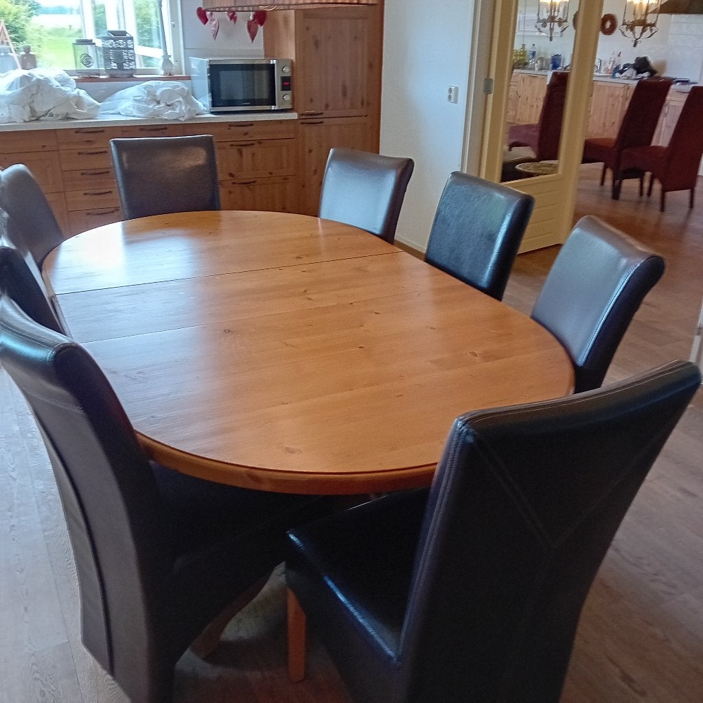 Te koop: eethoek met 8 leren stoelen en ovale tafel., Huis en Inrichting, Complete eetkamers, Ophalen, Gebruikt, 8 stoelen of meer