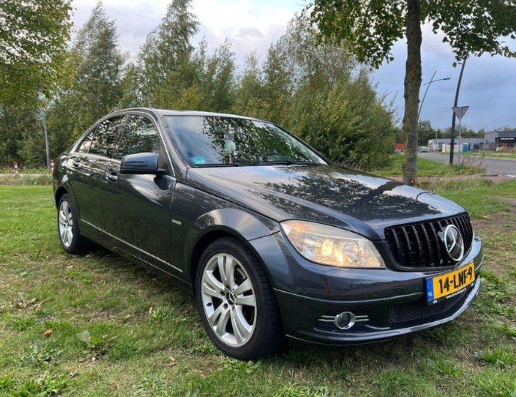 Mercedes-Benz C-Klasse 1.8 C180 CGI Sedan AUT 2010 Grijs, Auto's, Automaat, 745 kg, Achterwielaandrijving, 1800 kg