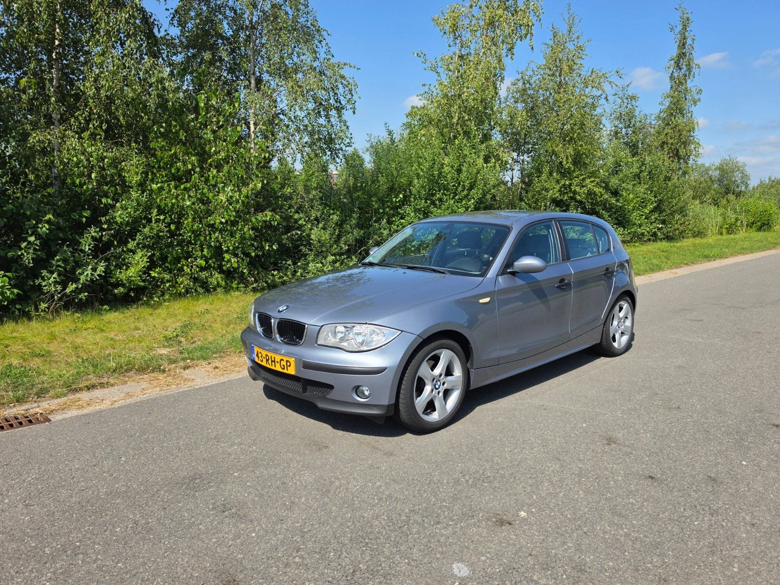 BMW 1-Serie 116i '05 Blauw - Climatecntrl - Trekhaak, 1596 cc, Achterwielaandrijving, 4 cilinders, Leder en Stof