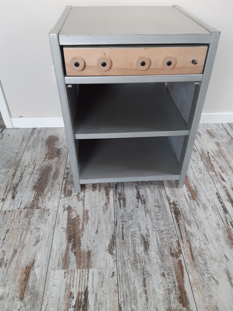 Houten speelgoedfornuis/kastje, Ophalen
