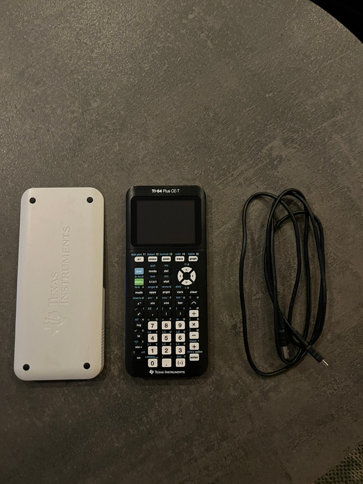 TI-84 Plus CE-T grafische rekenmachine met oplader, Ophalen of Verzenden, Grafische rekenmachine, Zo goed als nieuw