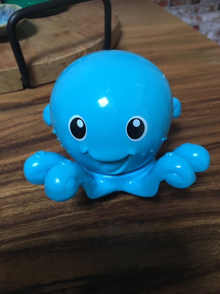 Duw- en trek speelgoed octopus loopt, Ophalen of Verzenden, Zo goed als nieuw, Overige typen, Met wieltjes