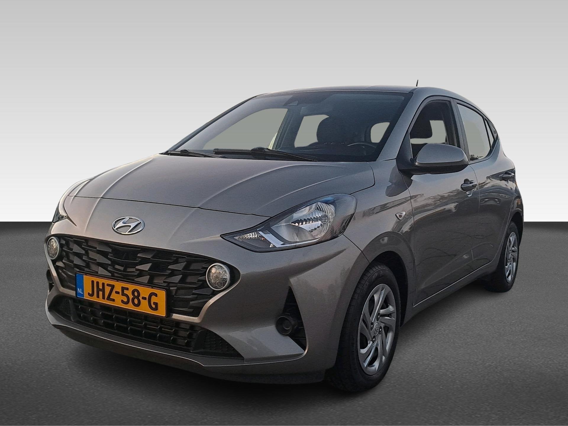 Hyundai i10 1.0i 67pk Premium, Auto's, Voorwielaandrijving, Stof, Gebruikt, Euro 6