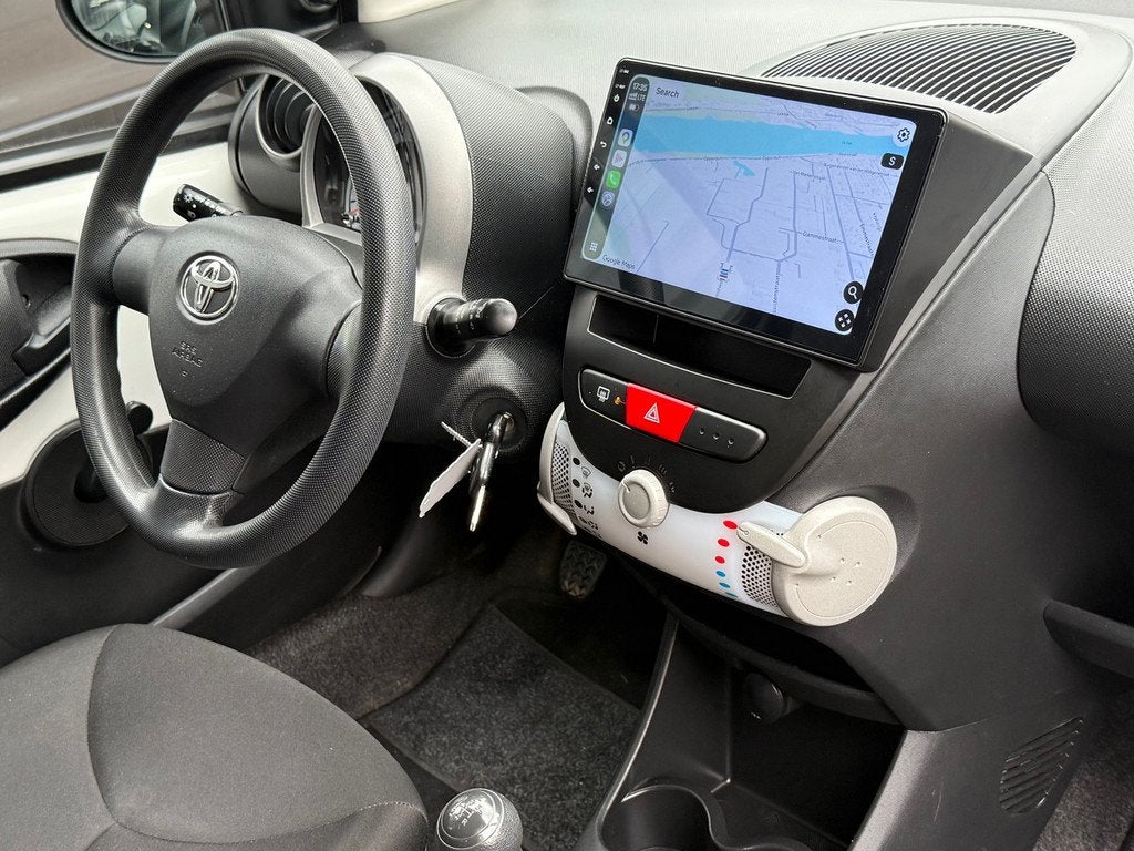 Toyota Aygo Gereserveerd!, Auto's, Voorwielaandrijving, Euro 5, Stof, Gebruikt