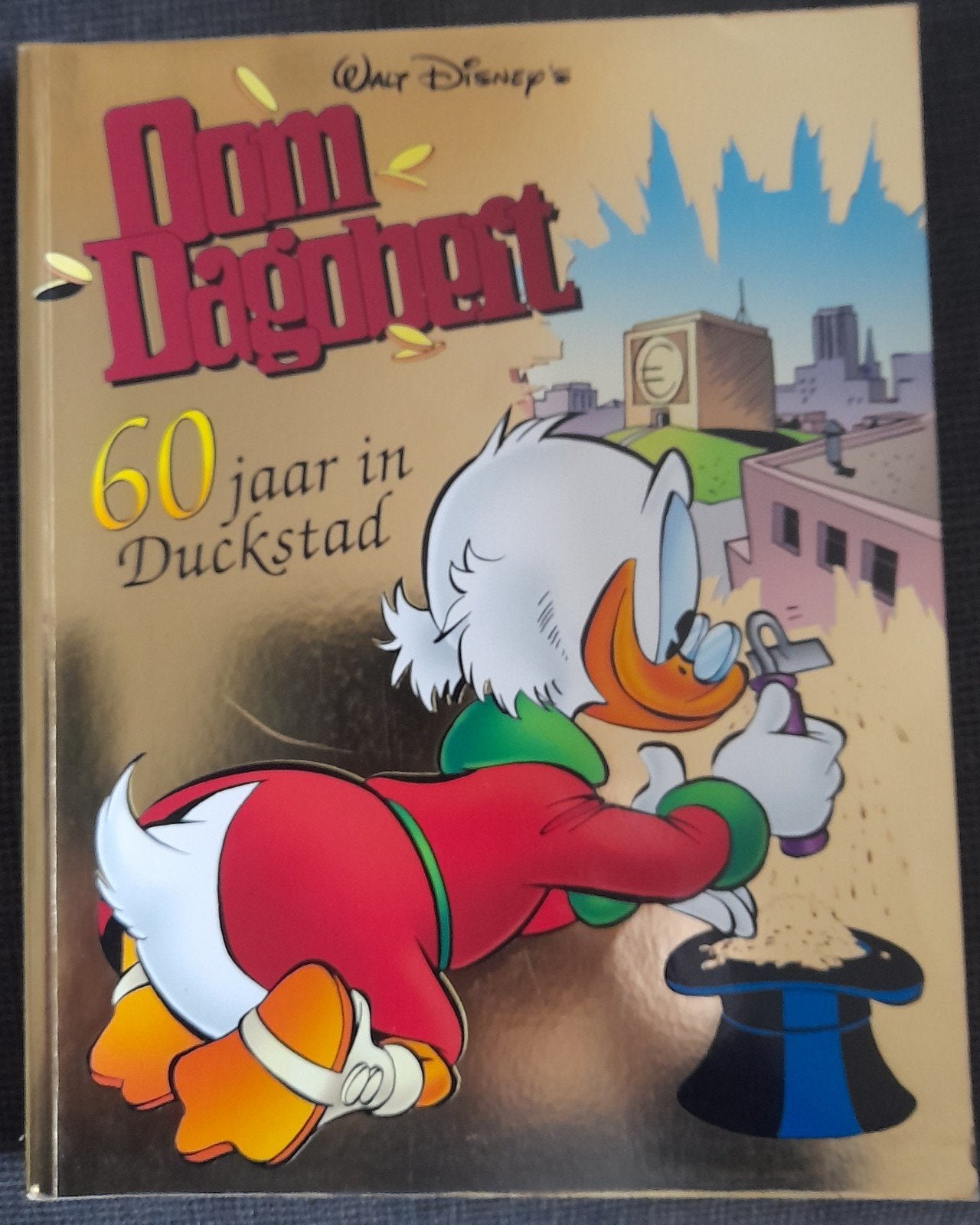 Oom Dagobert 60 jaar in duckstad, Boeken, Stripboeken, Eén stripboek, Ophalen of Verzenden