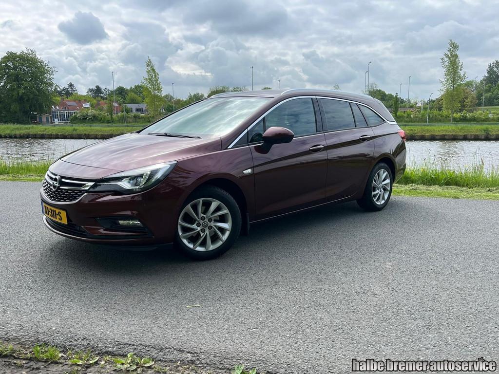 Opel Astra Sports Tourer 1.4 Executive|Trekhaak|Camera|Clima, Auto's, Voorwielaandrijving, Parkeersensor, Gebruikt, 4 cilinders